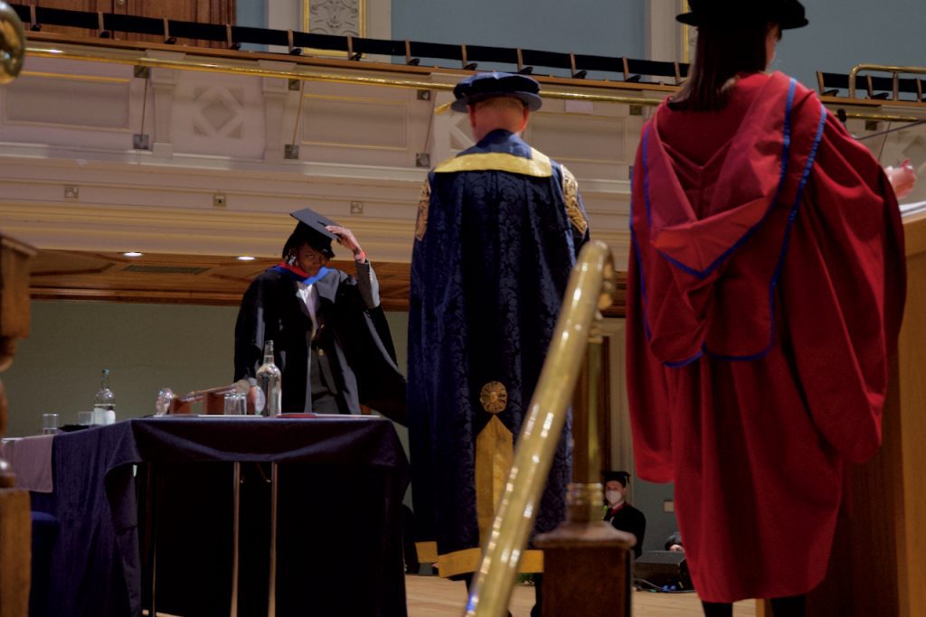 A graduand on the stage