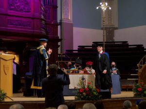 A graduand on the stage