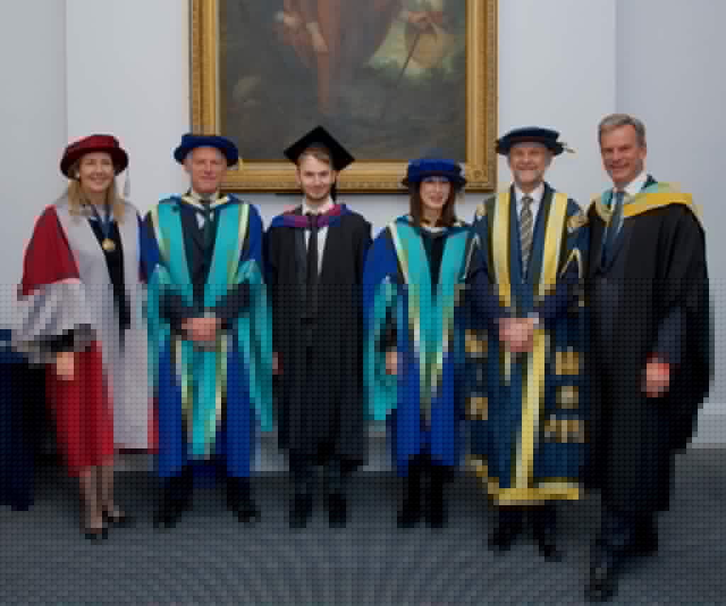 Ashley, Amanda and Andrew with the honorary doctorate and award recipients