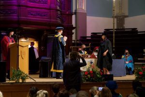 A graduand on the stage