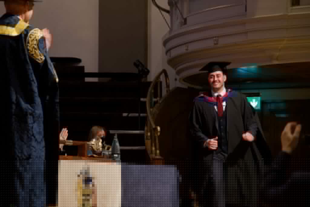 A graduand on the stage