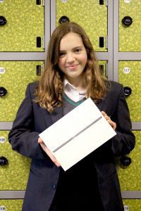 Erin with her iPad prize