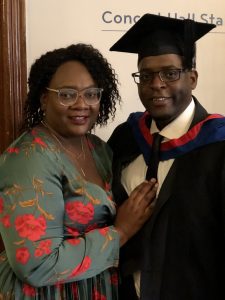 A graduand and his guest