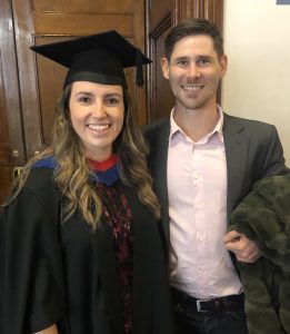 A graduand and her guest