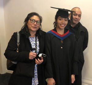 A graduand with her guests