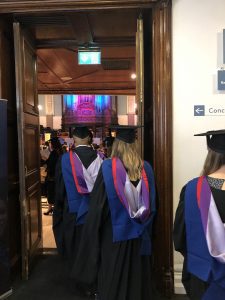 Graduands walk into the Concert Hall