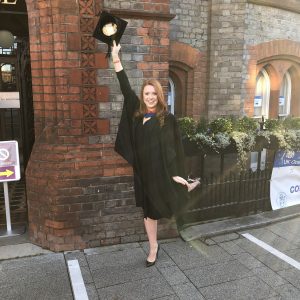 Graduate pulls a pose