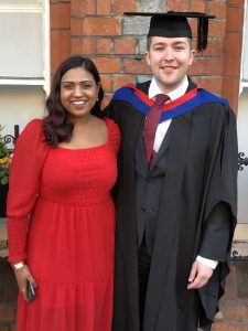 A graduand and his guest