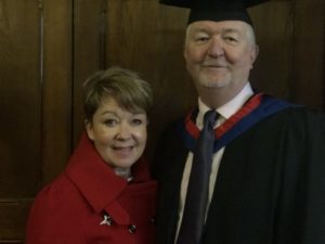 A graduand and his guest