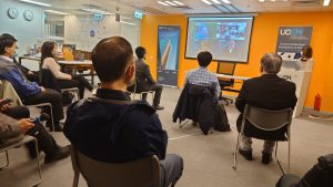 Attendees listening to speakers at the gathering